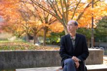 raymond on a bench outside DSI building